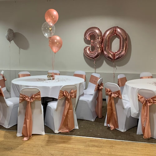 We offer white and black chair covers and table linen. We have a variety of coloured sashes and table runners.  And don’t worry, if you don’t see the colour you want, we’ll order it for you.